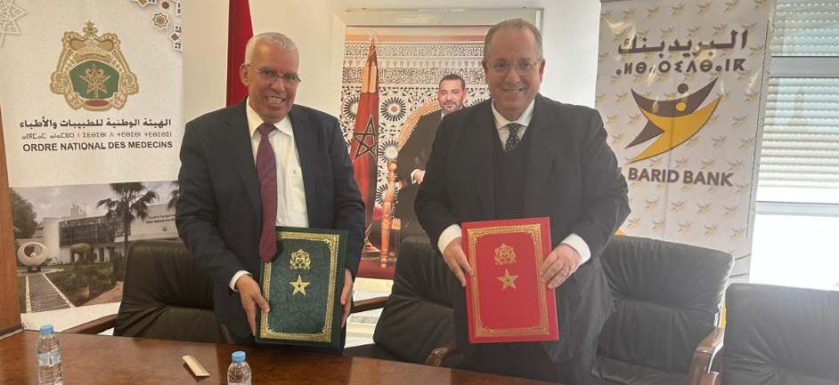 توقيع اتفاقية شراكة بين البريد بنك والمجلس الوطني لهيئة أطباء الأسنان